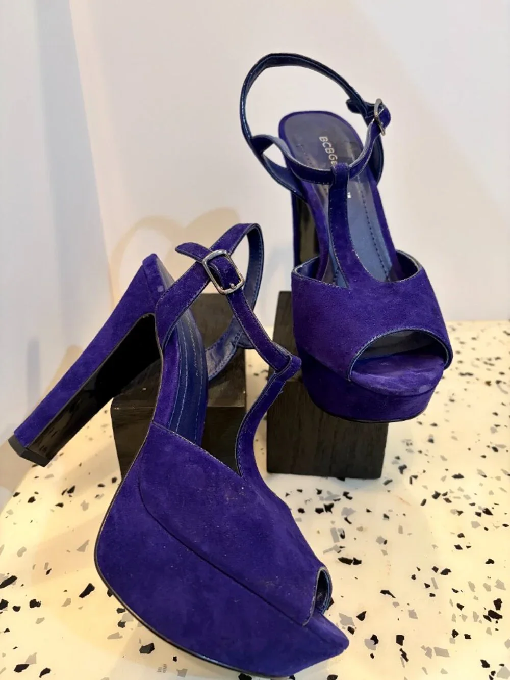 Suede Blue 7 1/2, excellent condition strap on shoe.